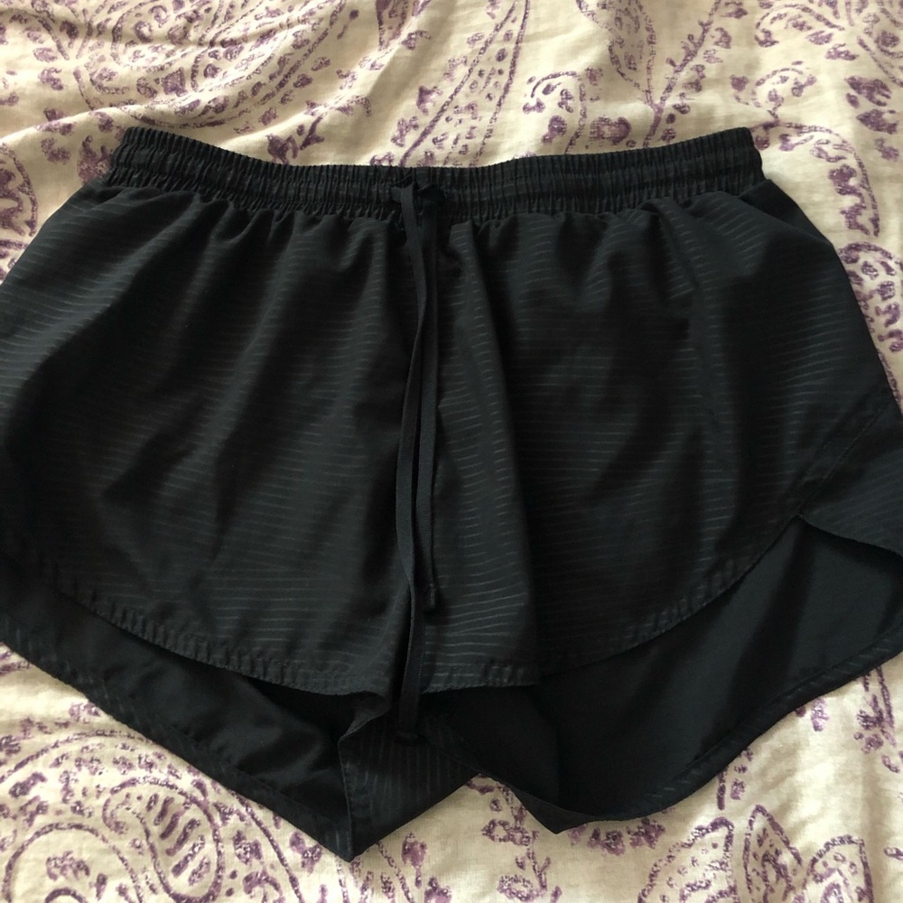 Black athletic shorts.